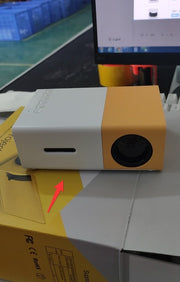 YG300 portable projector for movies and gaming