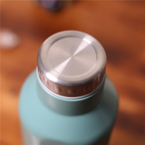 Portable stainless steel insulated water bottle style cup