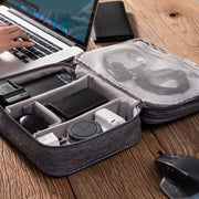 Portable waterproof electronics case for chargers and cables
