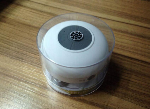 Small waterproof Bluetooth speaker for shower use